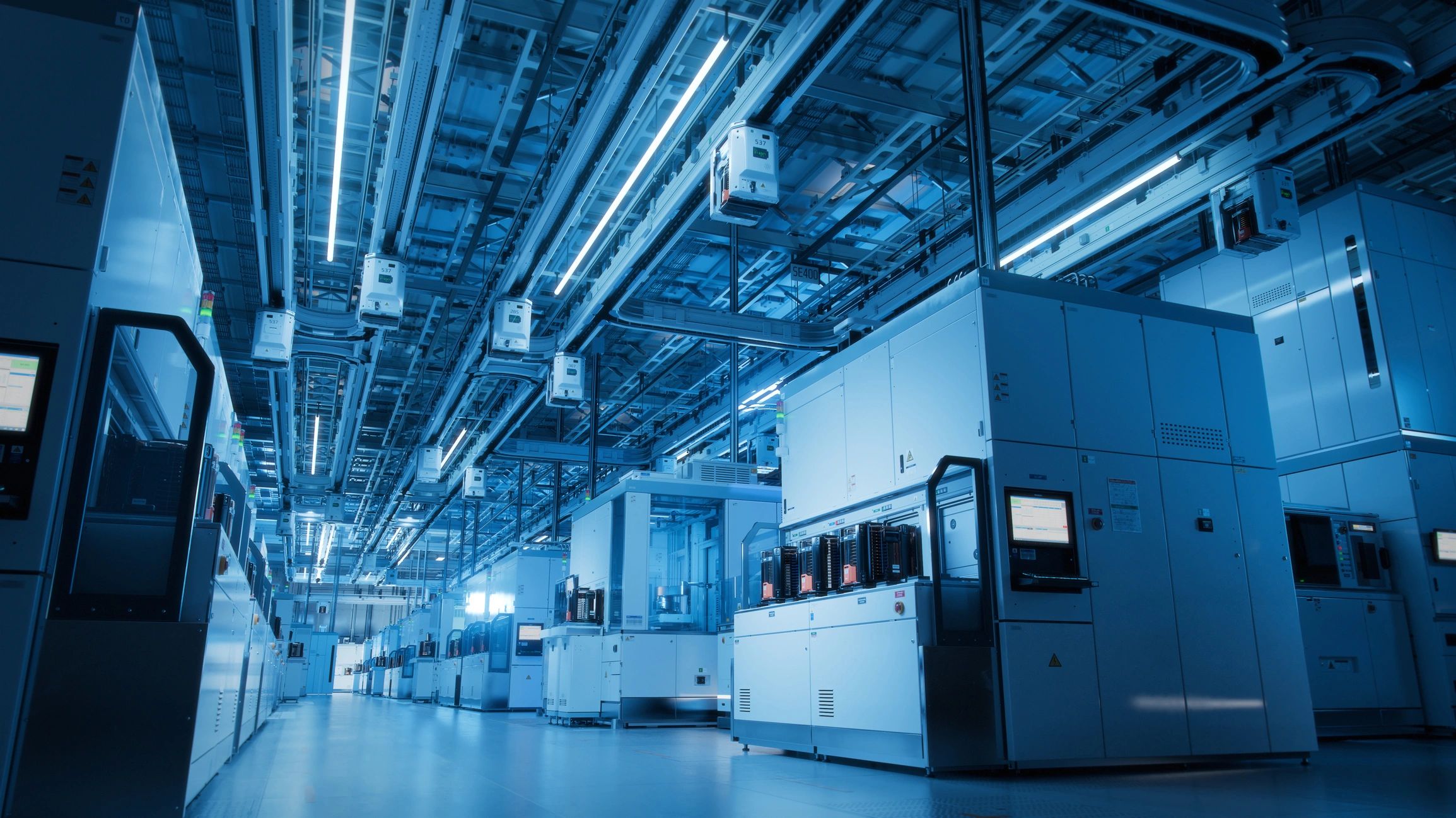 Automated wafer transfer system in a semiconductor production facility