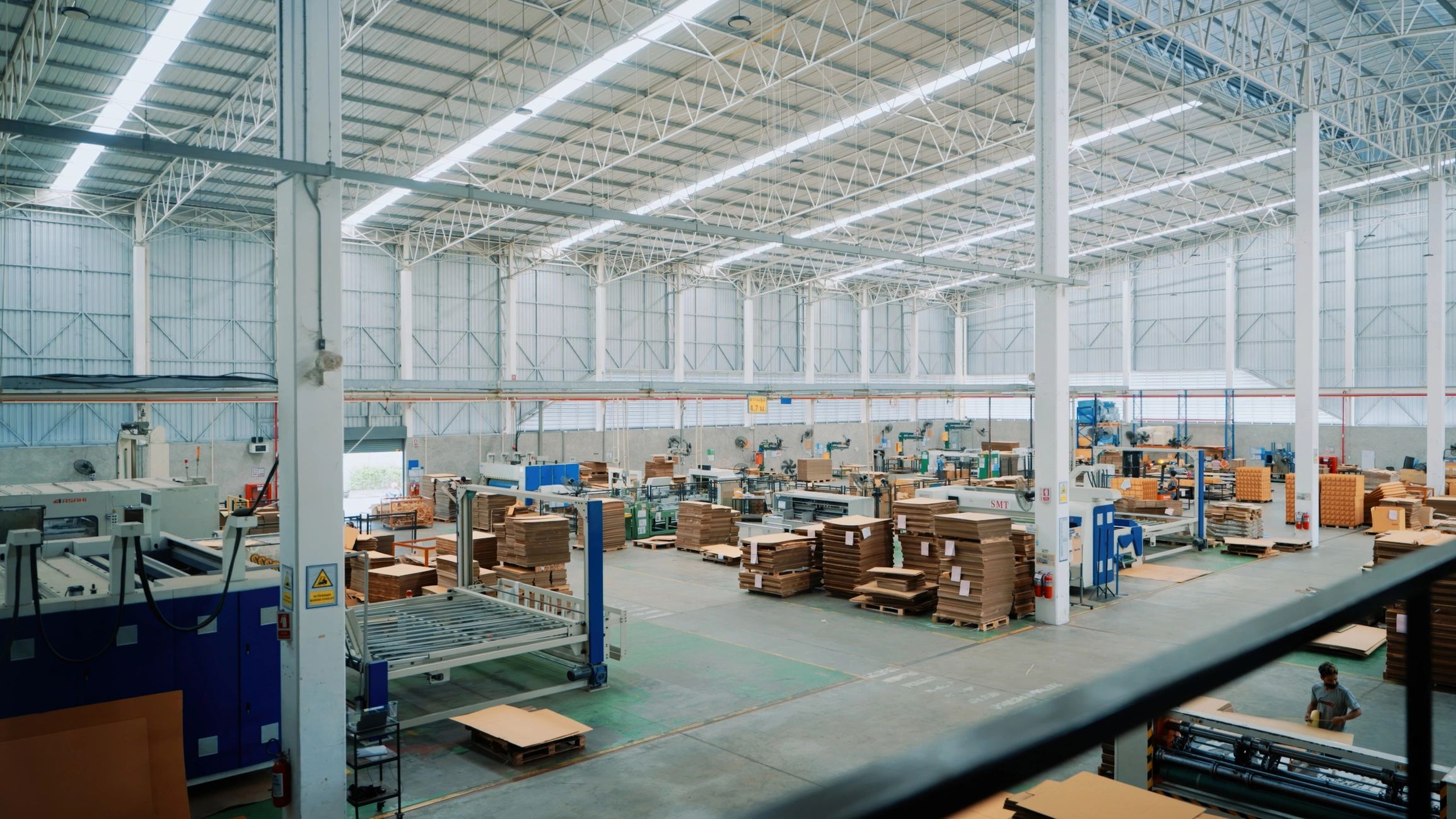 Modern industrial production floor with automated equipment